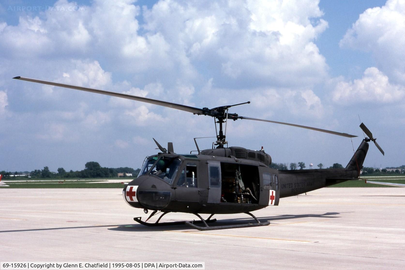 69-15926, 1969 Bell UH-1V Iroquois C/N 12214, Medevac Huey passing through.
