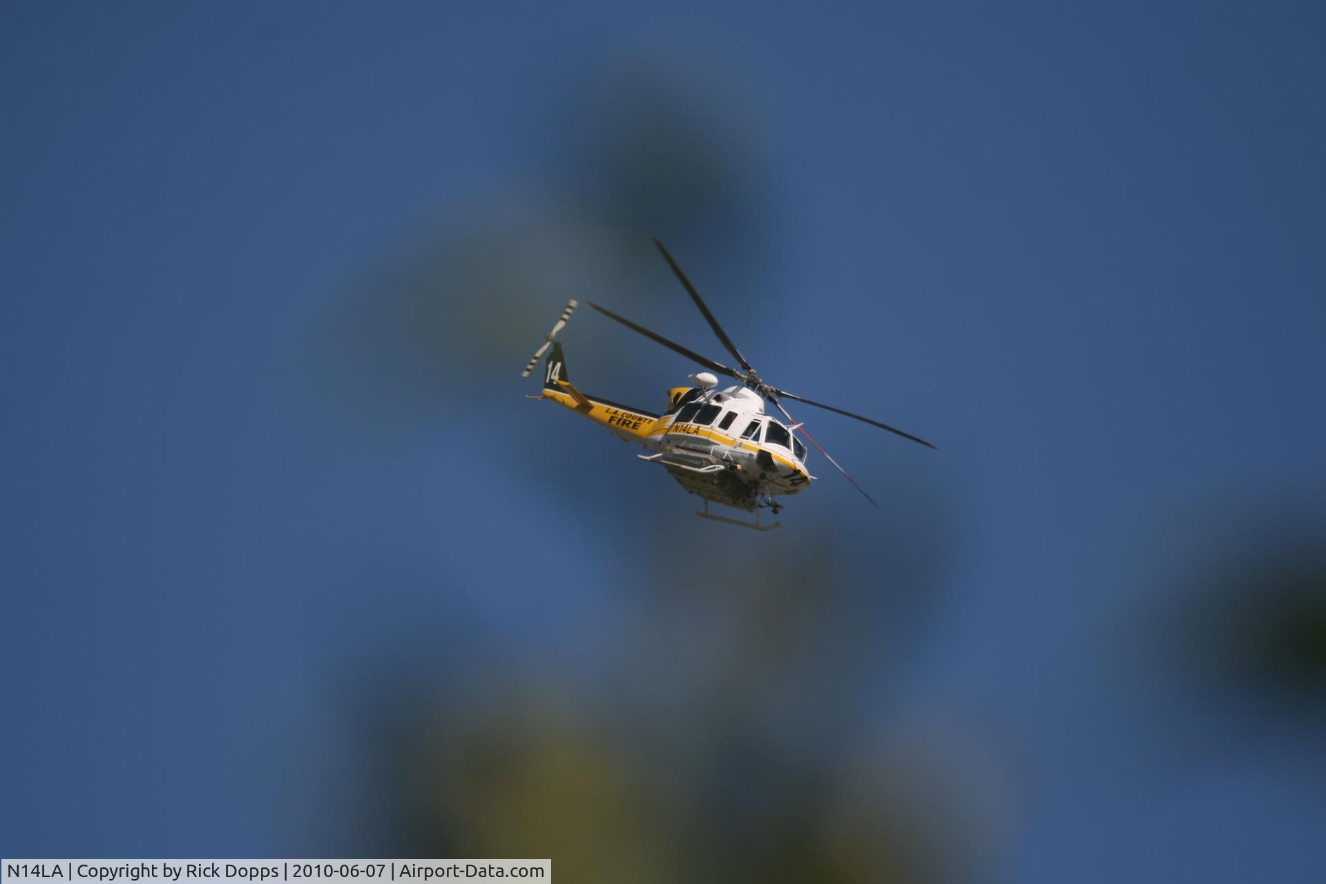 N14LA, 2005 Bell 412EP C/N 36393, Flying over park in San Dimas, CA