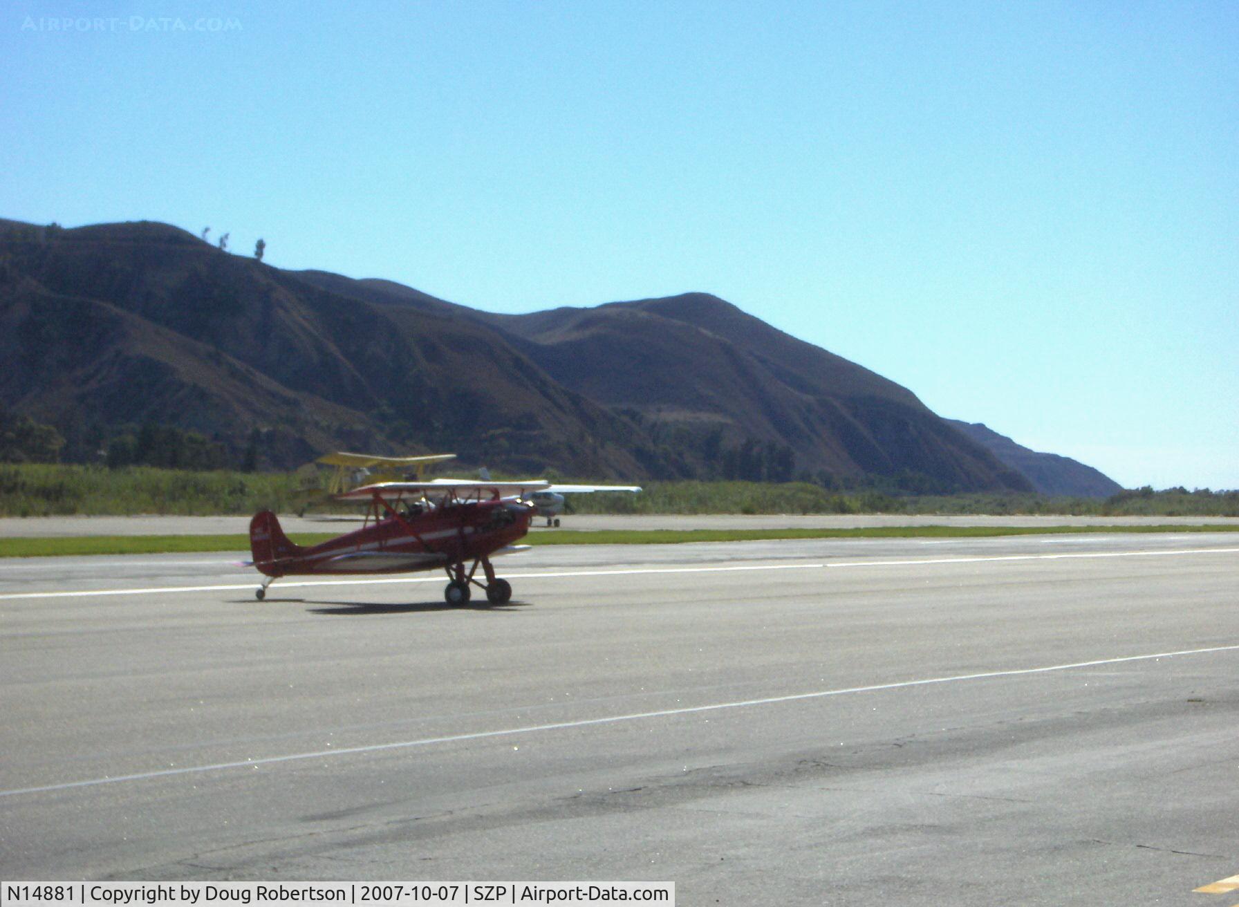N14881, 1936 Rose Parrakeet A-1 C/N 105, 1936 Rose A-1 PARRAKEET as NC14881, Continental C85  85 Hp, restored very limited production aircraft and modified cowl and engine upgrade from original Continental A40 37 Hp, taxi turn from landing Rwy 04