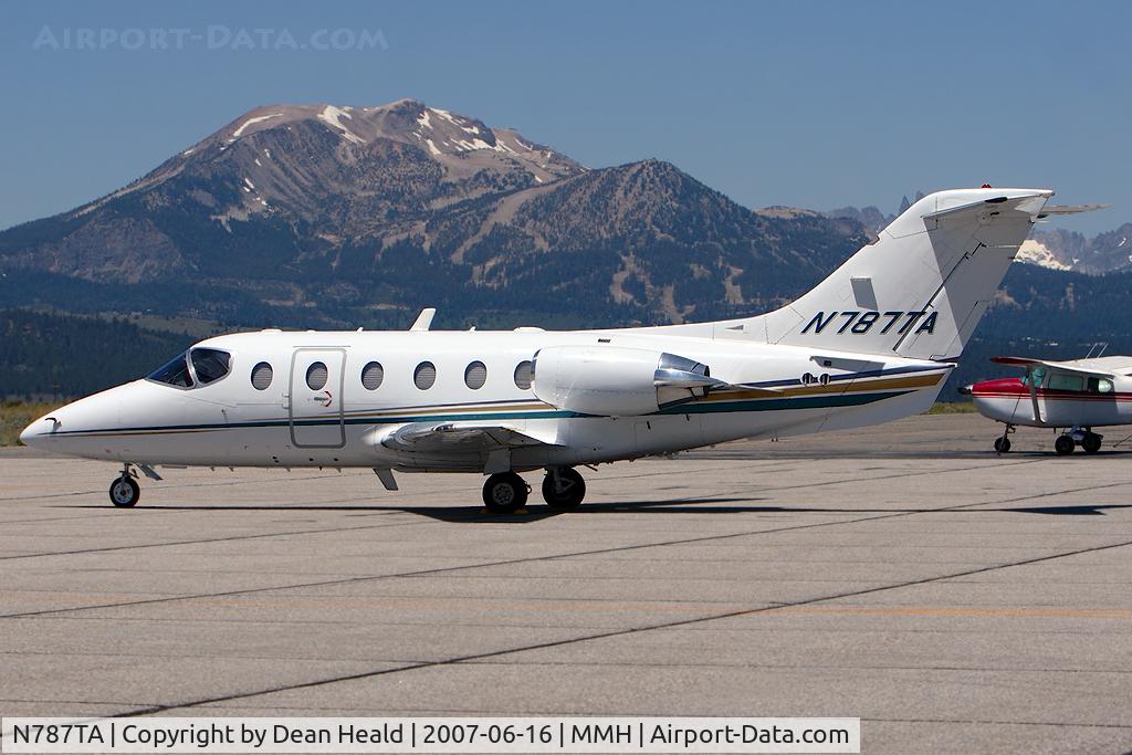 N787TA, Raytheon Aircraft Company 400A C/N RK-260, This Flight Options Beechjet 400A was the lone bizjet parked on the ramp this summer day. Mammoth Mountain can be seen in the background.