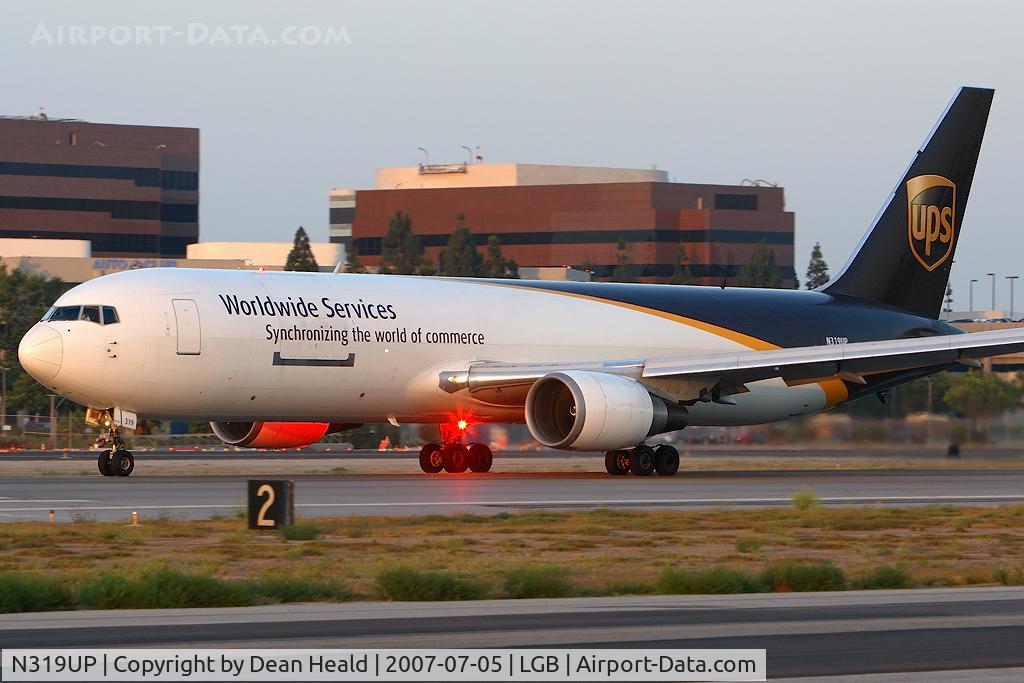 N319UP, 1997 Boeing 767-34AF C/N 27758, United Parcel Service (UPS) N319UP (FLT UPS905) departing RWY 30 enroute to Louisville Intl-Standiford Field (KSDF).