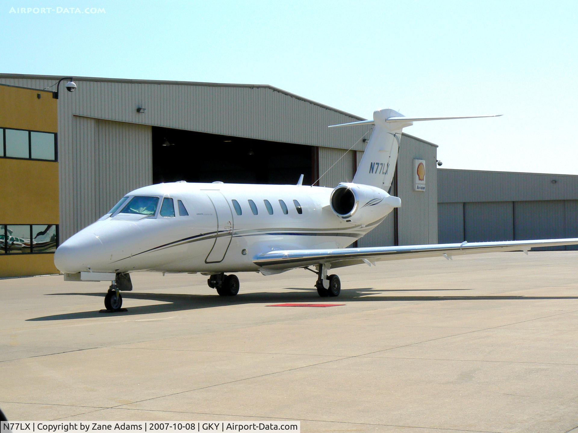 N77LX, 1995 Cessna 650 C/N 650-7051, on the ramp at Arlington Muni