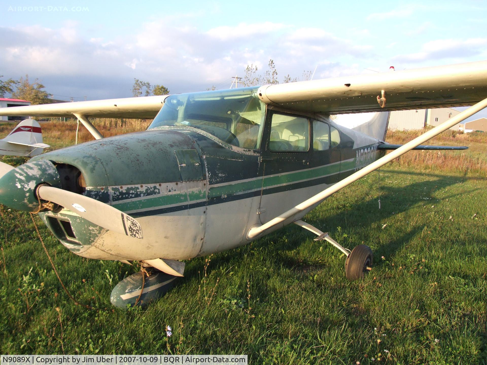 N9089X, 1961 Cessna 182D Skylane C/N 18253489, somewhat neglected old bird, tied down in the weeds
