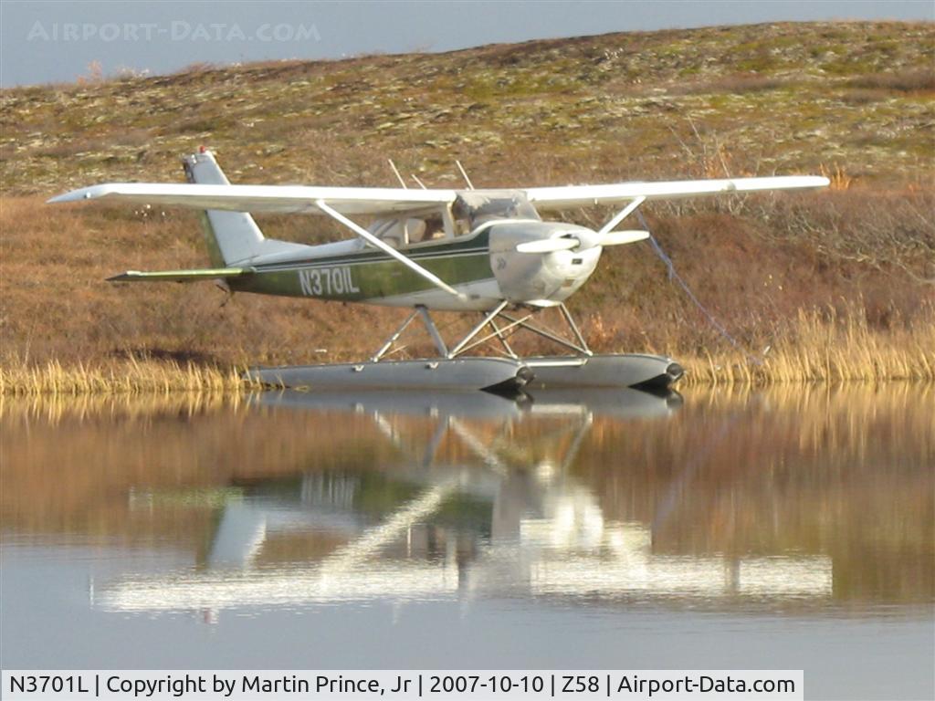 N3701L, 1966 Cessna 172G C/N 17253870, Awaiting its turn to be pulled from the lake before freeze up