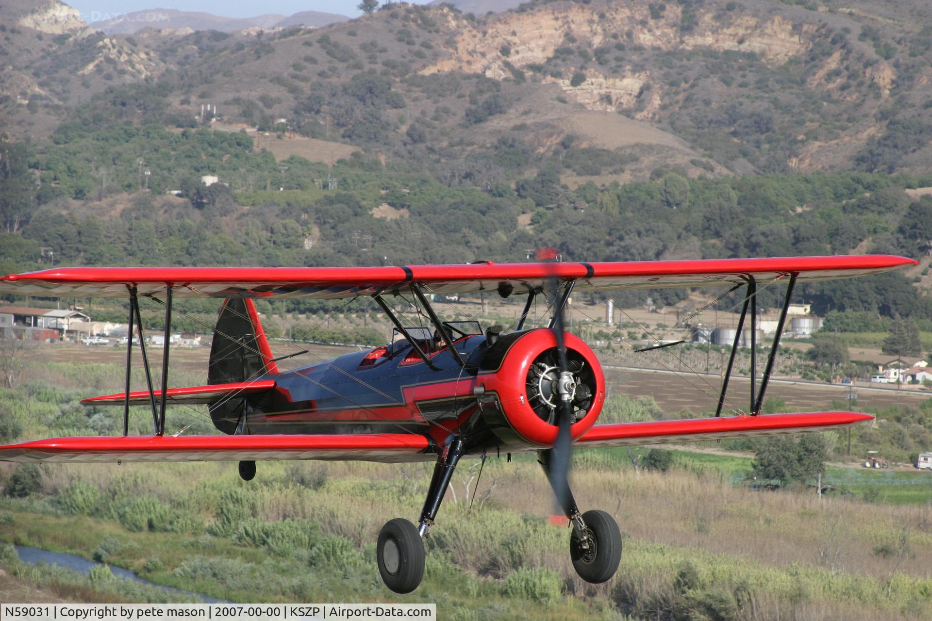 N59031, 1941 Boeing A75N1(PT17) C/N 75-3808, stearman with cowling taking off from KSZP