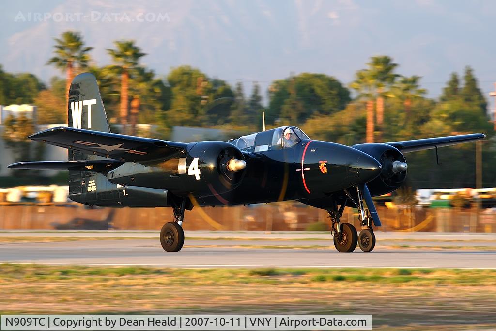 N909TC, 1945 Grumman F7F-3P Tigercat C/N 80425, Grumman F7F-3P Tigercat NX909TC thundering down RWY 16R during a pattern work session.  What an awesome machine... I was so fortunate to see it and capture the moment.