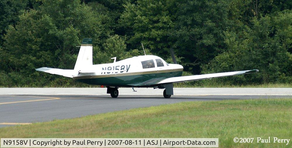 N9158V, 1969 Mooney M20F Executive C/N 690040, Taxiing out from the ramp