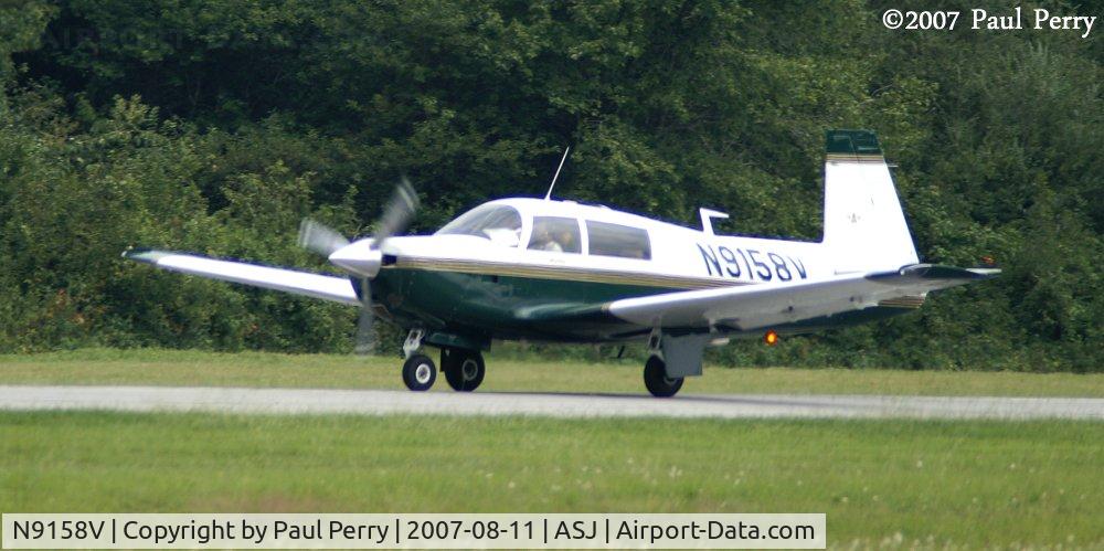 N9158V, 1969 Mooney M20F Executive C/N 690040, Accelerating down the runway