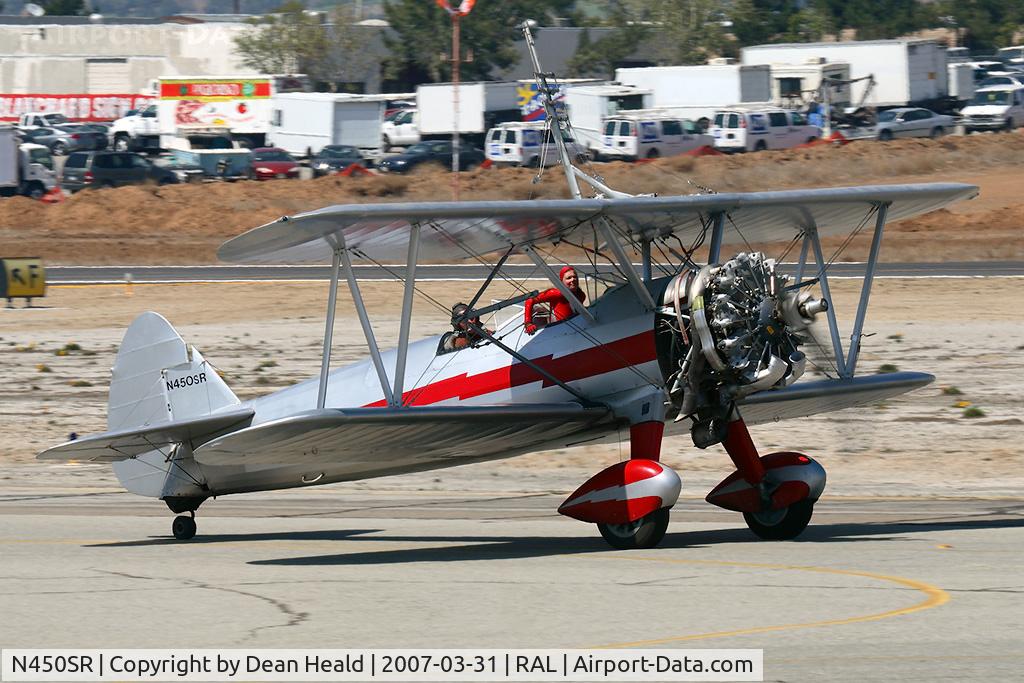 N450SR, 1942 Boeing B75N1 C/N 75-7016, Silver Wings Stearman B75N1 N450SR taxiing to RWY 27 for takeoff.  Pilot is Hartley Folstad and the wing walker is Margaret Stivers.