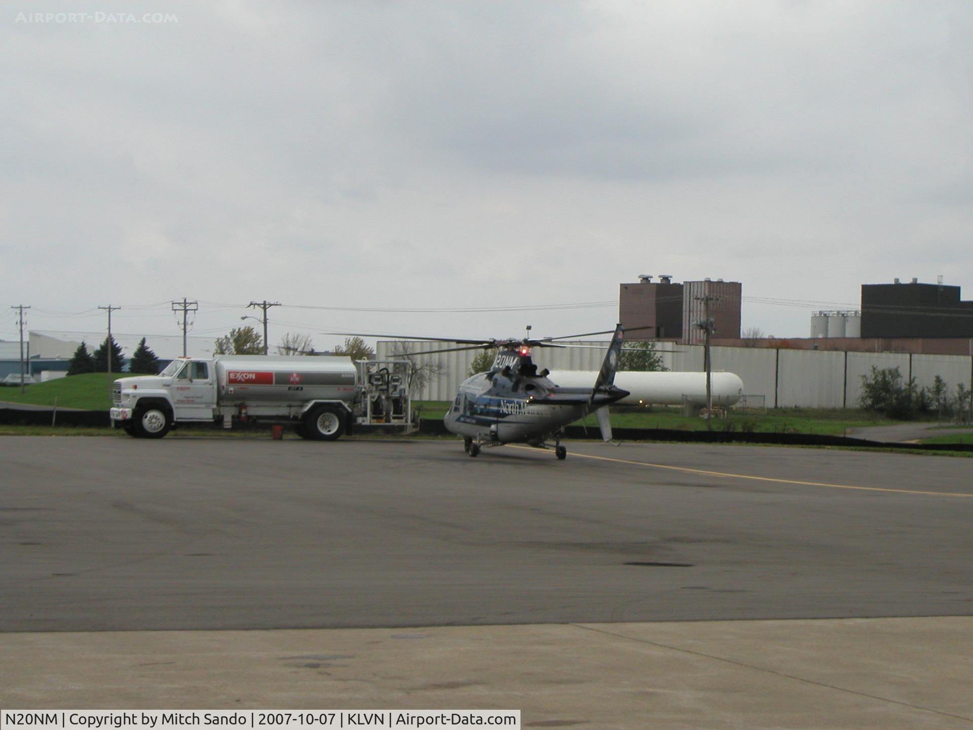 N20NM, 1993 Agusta A-109C C/N 7661, Parked outside the hangar.