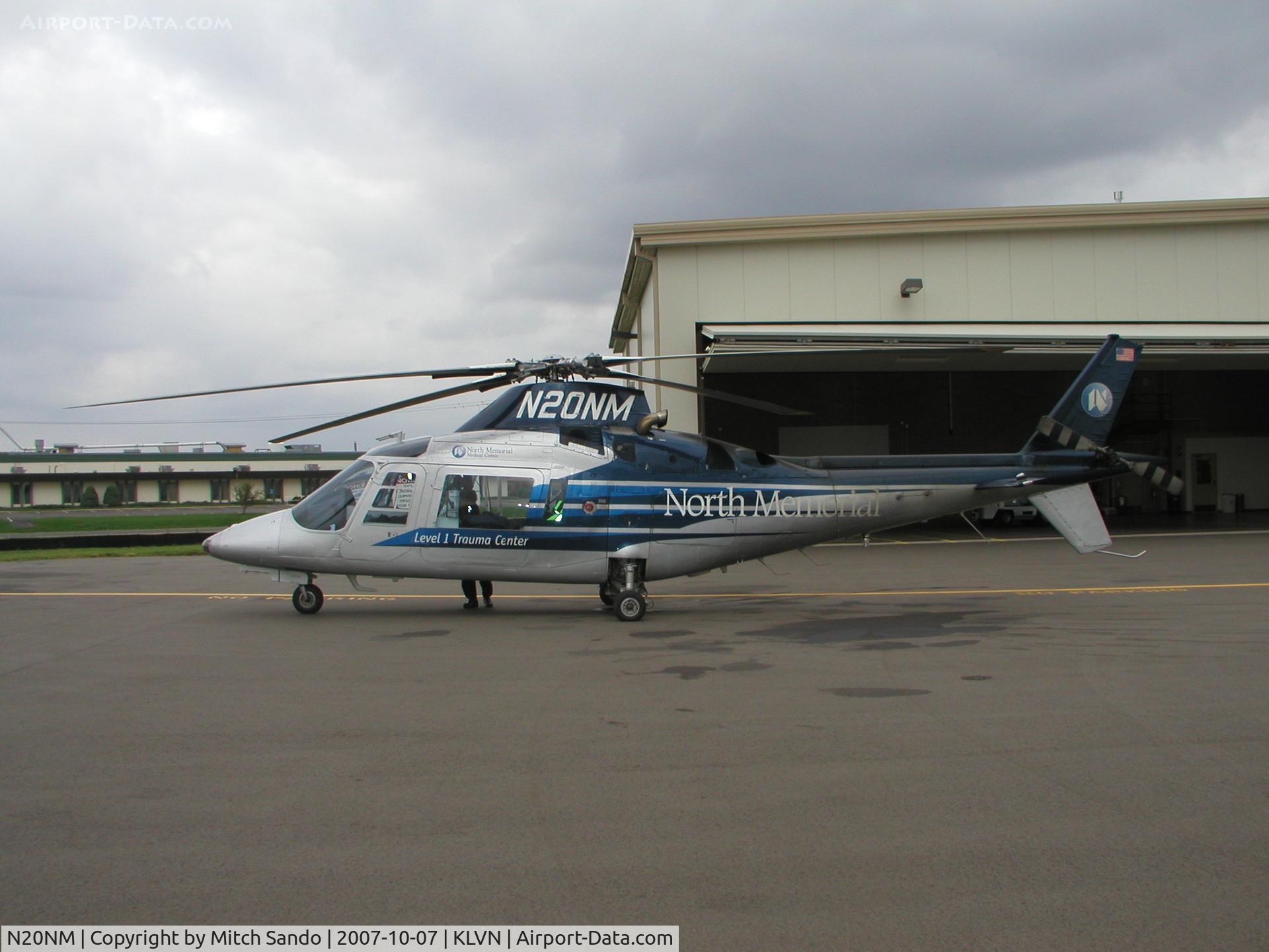 N20NM, 1993 Agusta A-109C C/N 7661, Parked outside the hangar.