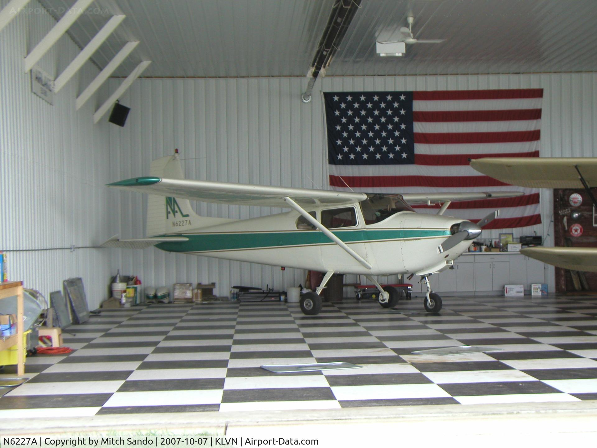 N6227A, 1956 Cessna 182 Skylane C/N 33027, Parked inside the hangar.