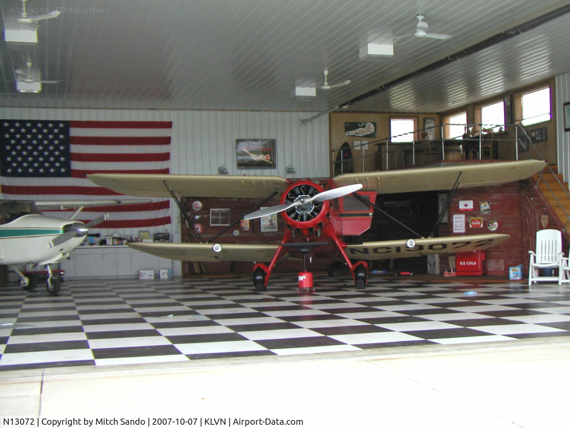 N13072, 1933 Waco UIC C/N 3724, Parked inside the hangar.