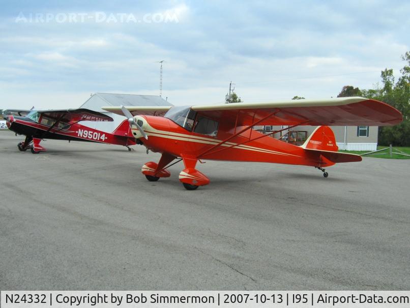 N24332, 1940 Taylorcraft BC-65 C/N 1667, Mike Lutz's award winning ride on the ramp next to Sam Weaver's N95014 in Kenton, OH