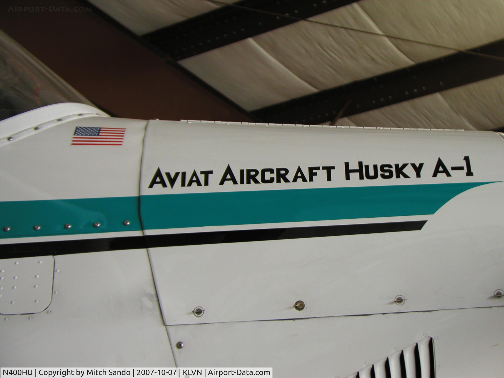 N400HU, 1997 Aviat A-1 Husky C/N 1346, Parked inside the hangar.