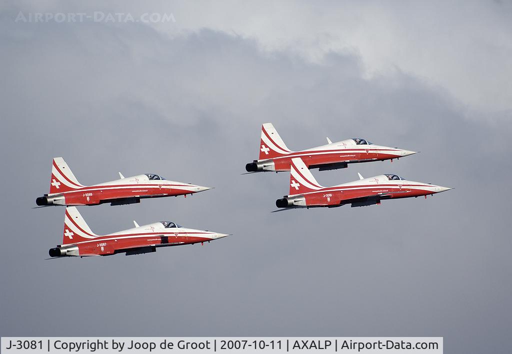 J-3081, Northrop F-5E Tiger II C/N L.1081, After their demonstration four Patrouille Tigers made one final pass along the Axalphorn. Although photographed from the mountain peak the cloud cover in the Haslital makes this a virtual air to air picture.
