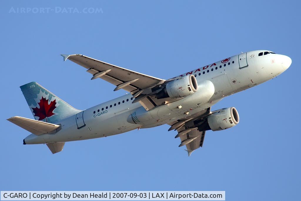 C-GARO, 1997 Airbus A319-114 C/N 757, Air Canada C-GARO (FLT ACA557) climbing out from RWY 24L enroute to Vancouver Int'l (CYVR).