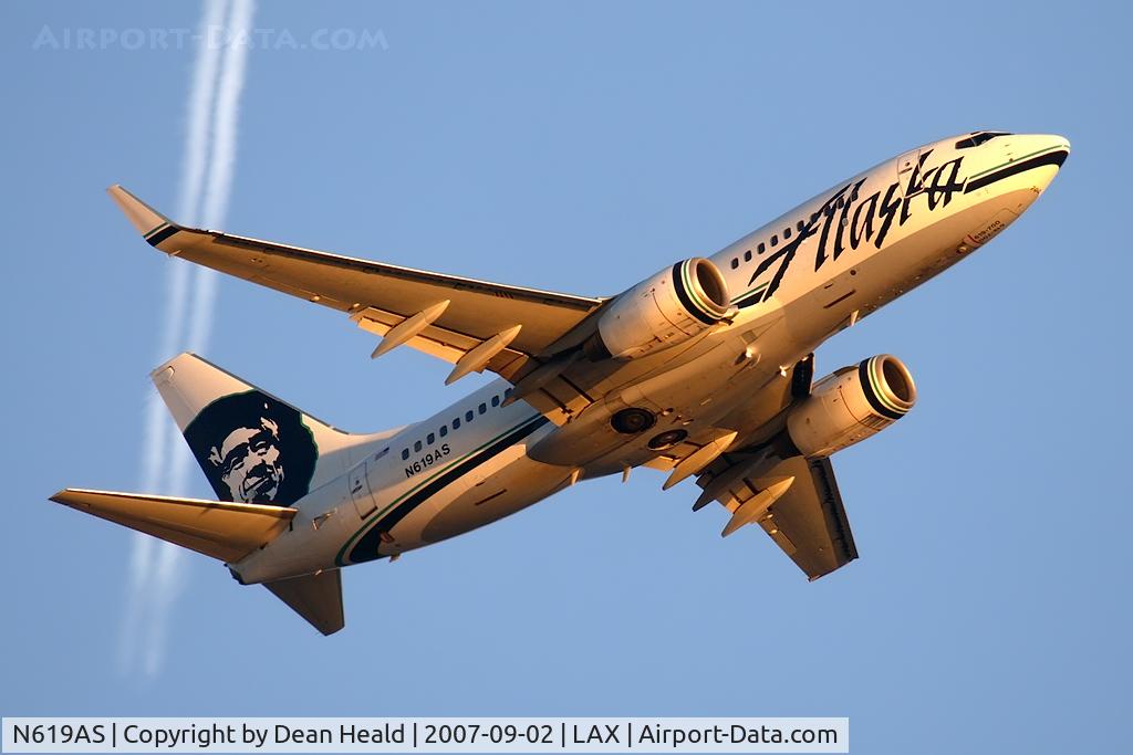 N619AS, 2000 Boeing 737-790 C/N 30164, Alaska Airlines N619AS (FLT ASA597), in nice evening light, climbing out from RWY 24L enroute to Seattle-Tacoma Int'l (KSEA).