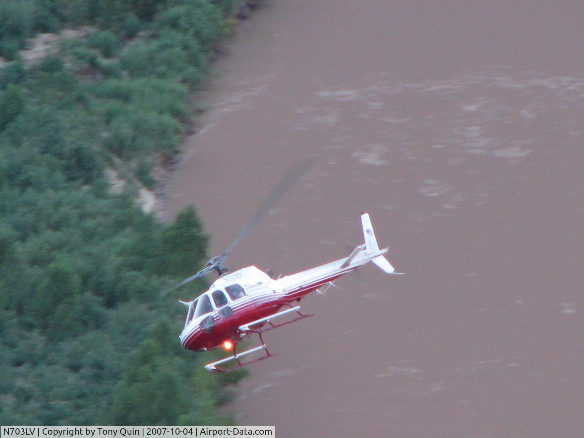 N703LV, 1995 Aerospatiale AS-350B-2 Ecureuil C/N 2896, Arriving Grand Canyon pic-nic area. Taken from pic-nic area above.