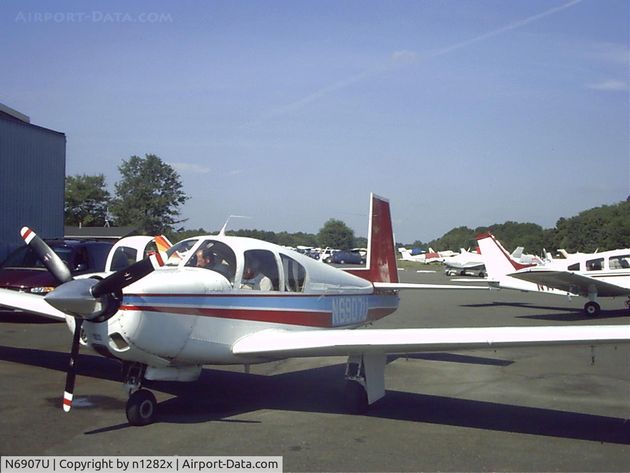 N6907U, 1964 Mooney M20E C/N 419, ON the ramp in New Jersey