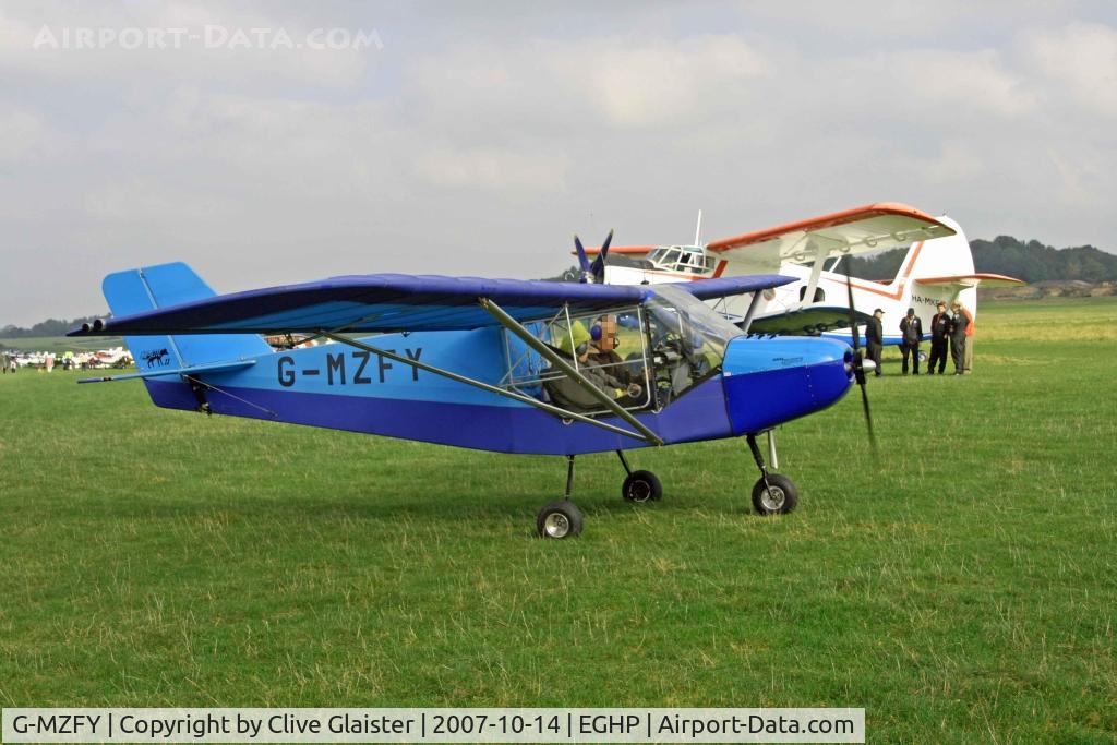 G-MZFY, 1997 Rans S-6ESD XL Coyote II C/N PFA 204-13043, HEX: 403D87