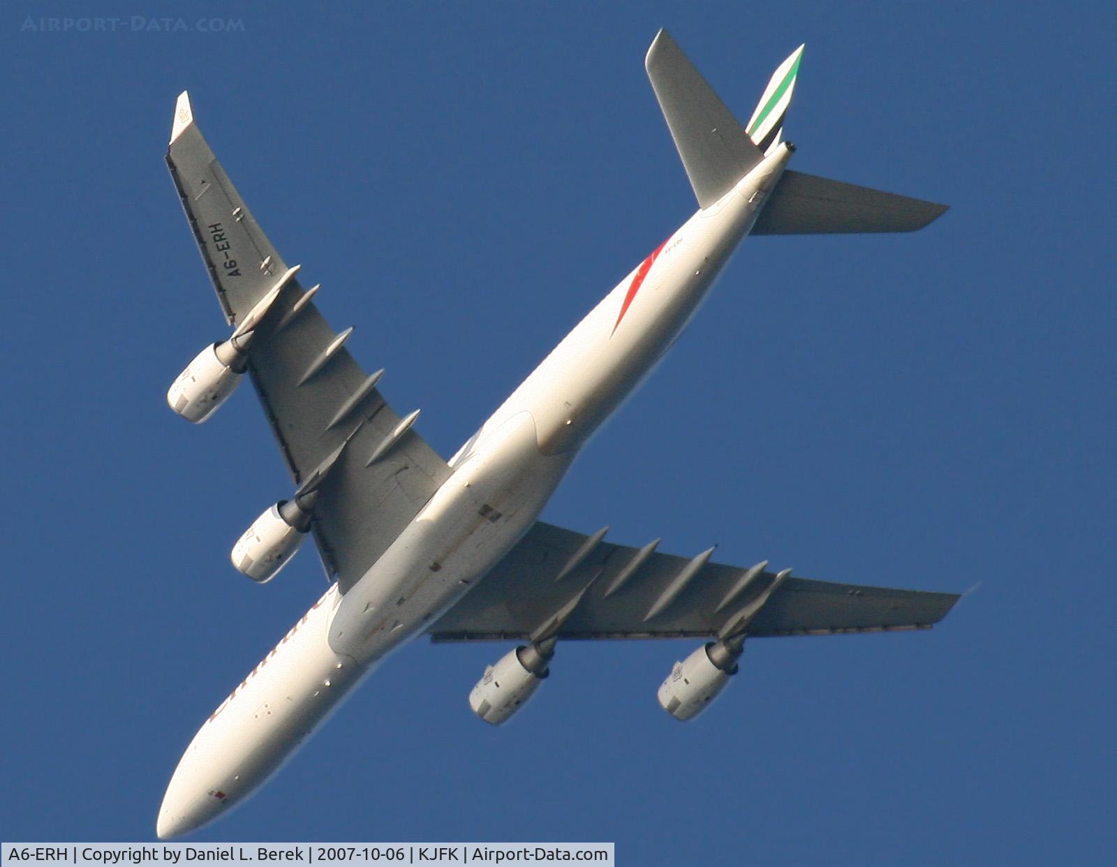 A6-ERH, 2004 Airbus A340-541 C/N 611, An Italian Boeing Triple-7 glides serenly over New Jersey's Sandy Hook on it approach to JFK.