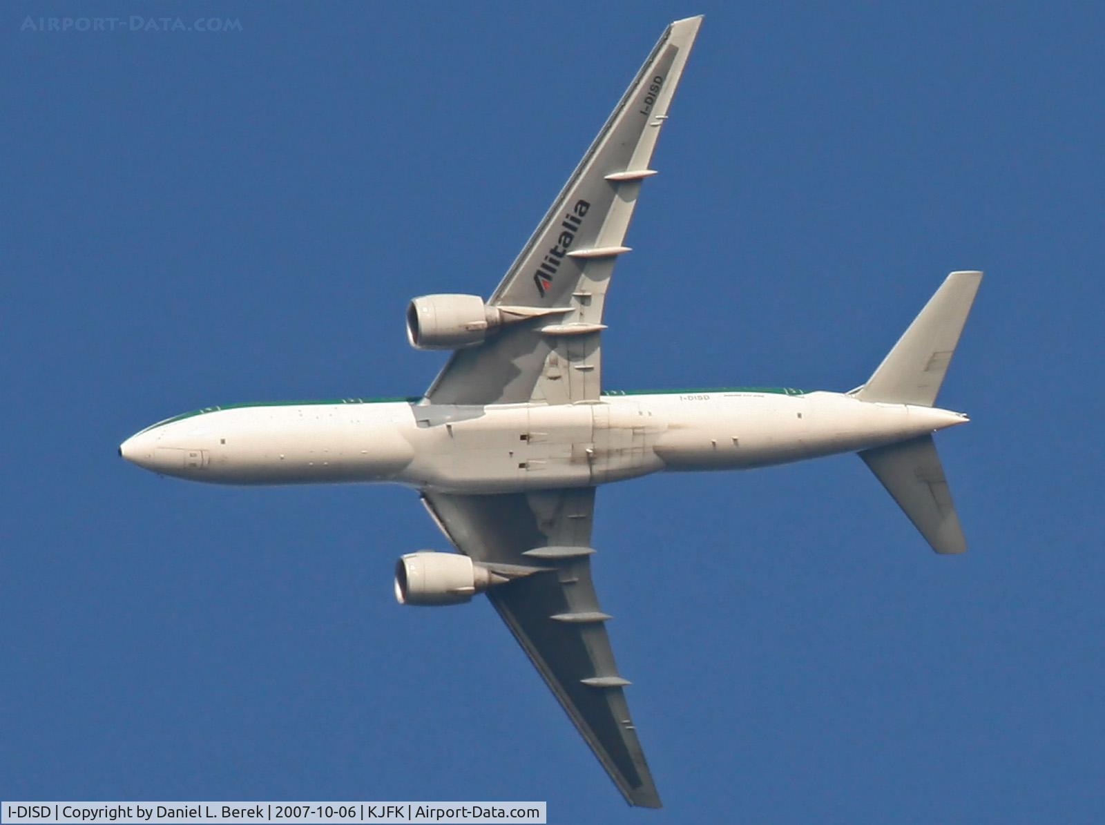 I-DISD, 2003 Boeing 777-243/ER C/N 32860, An Italian Boeing Triple-7 glides serenly over New Jersey's Sandy Hook on it approach to JFK.