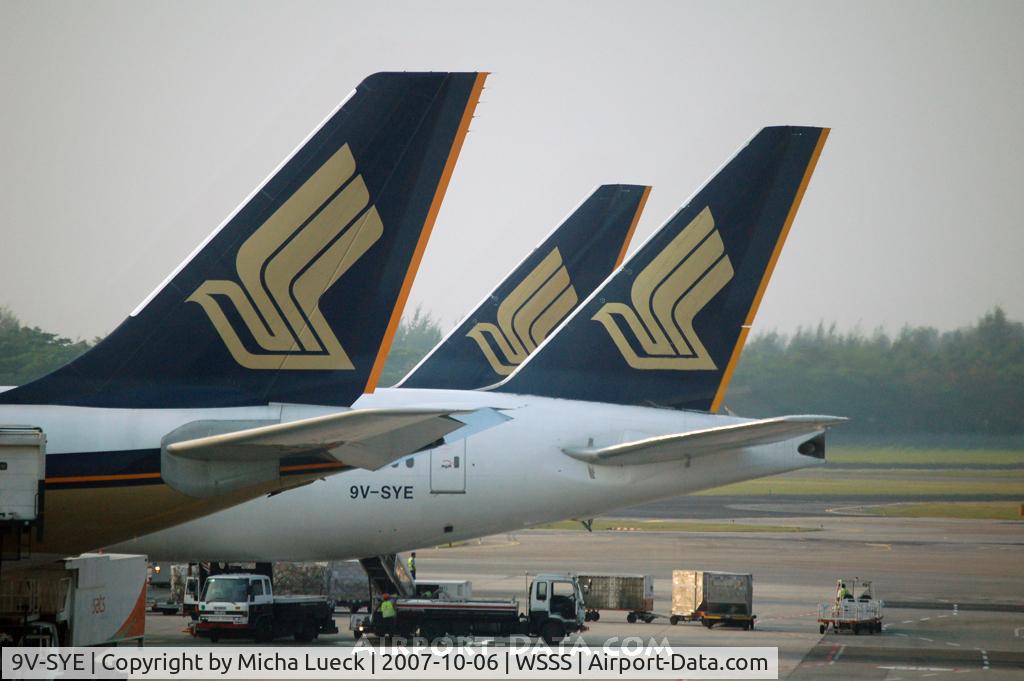 9V-SYE, 1999 Boeing 777-312 C/N 28531, SIA B777 line-up at Changi