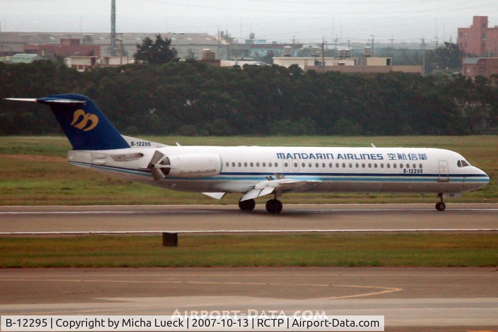 B-12295, 1994 Fokker 100 (F-28-0100) C/N 11527, Just touched down, thrust reversers deployed