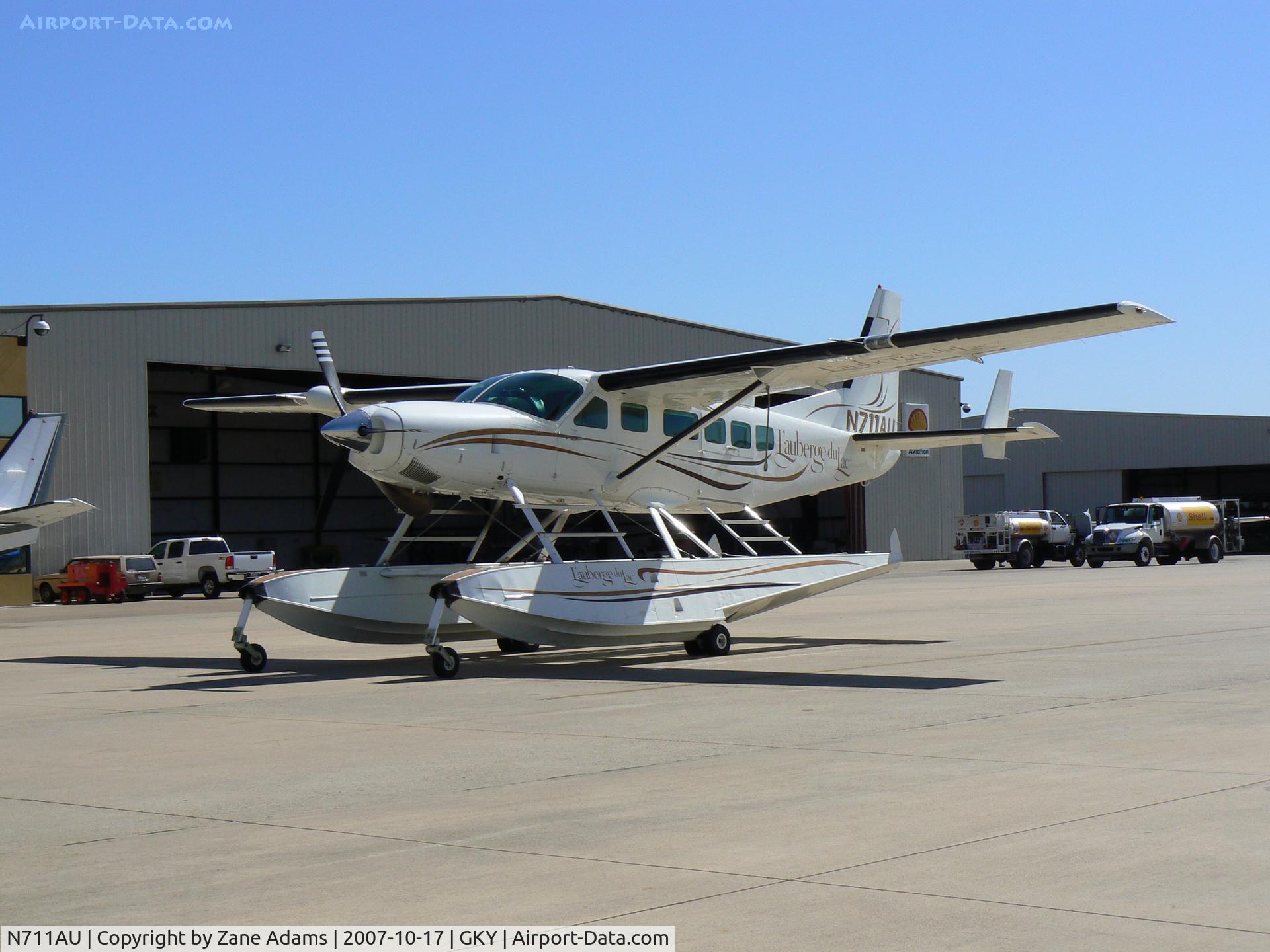 N711AU, 1990 Cessna 208 Caravan I C/N 208-00175, on the ramp at Arlington Muni