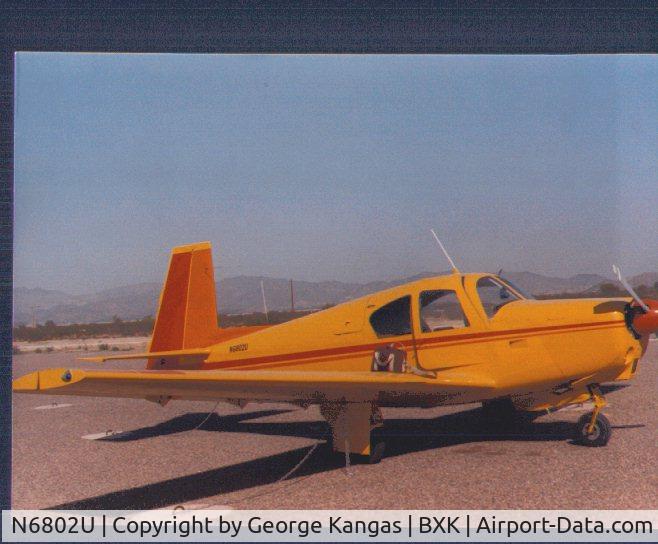 N6802U, 1963 Mooney M20C Ranger C/N 2517, On the ramp at Buckeye AZ 1983