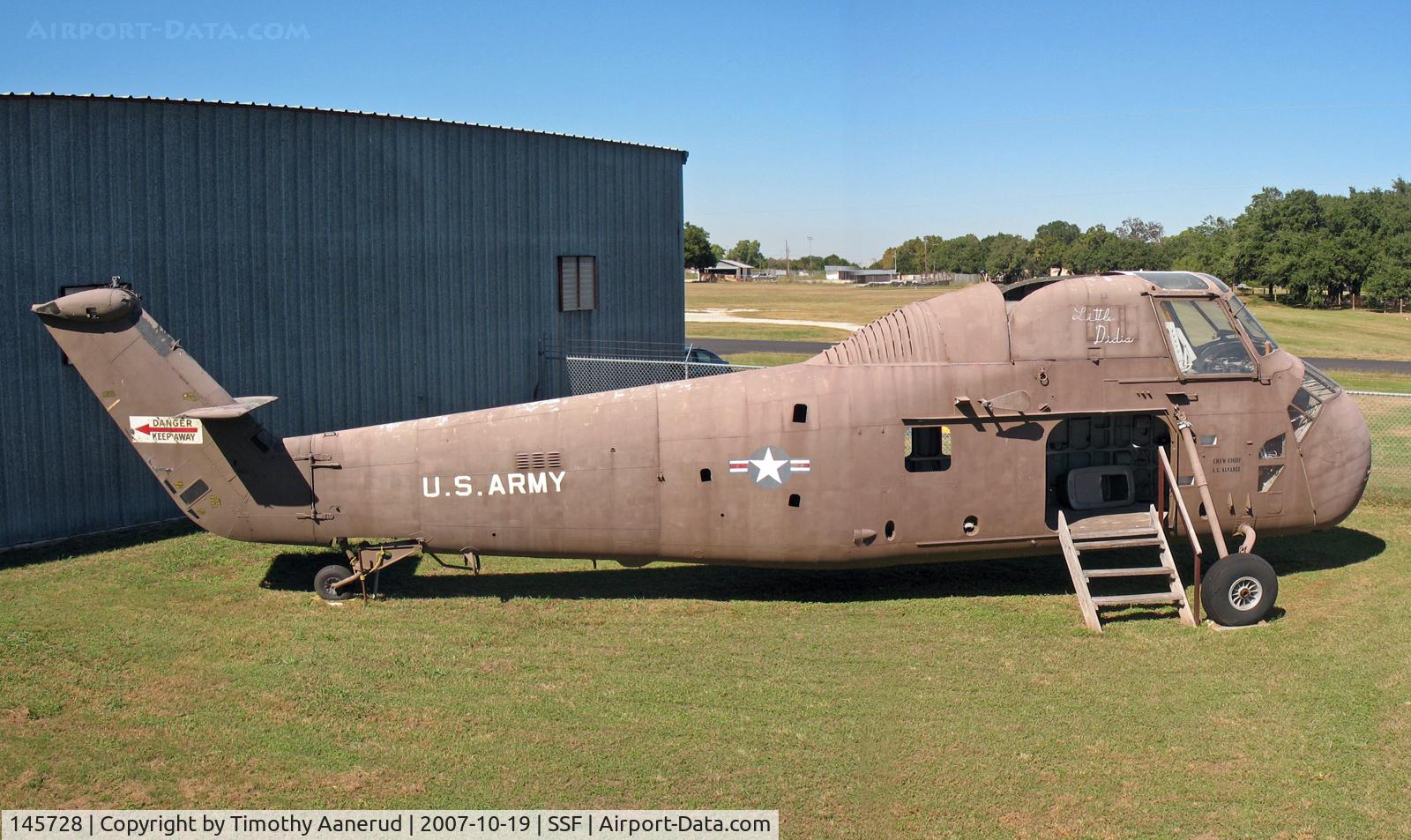 145728, Sikorsky UH-34E Seahorse C/N 58-896, Sikorsky H-34, Texas Air Museum, museum person said it was left behind by a company that moved to California, photo stitched from 2 images. BuNo 145728.  Being restored in Army colors. Was all white in 2001