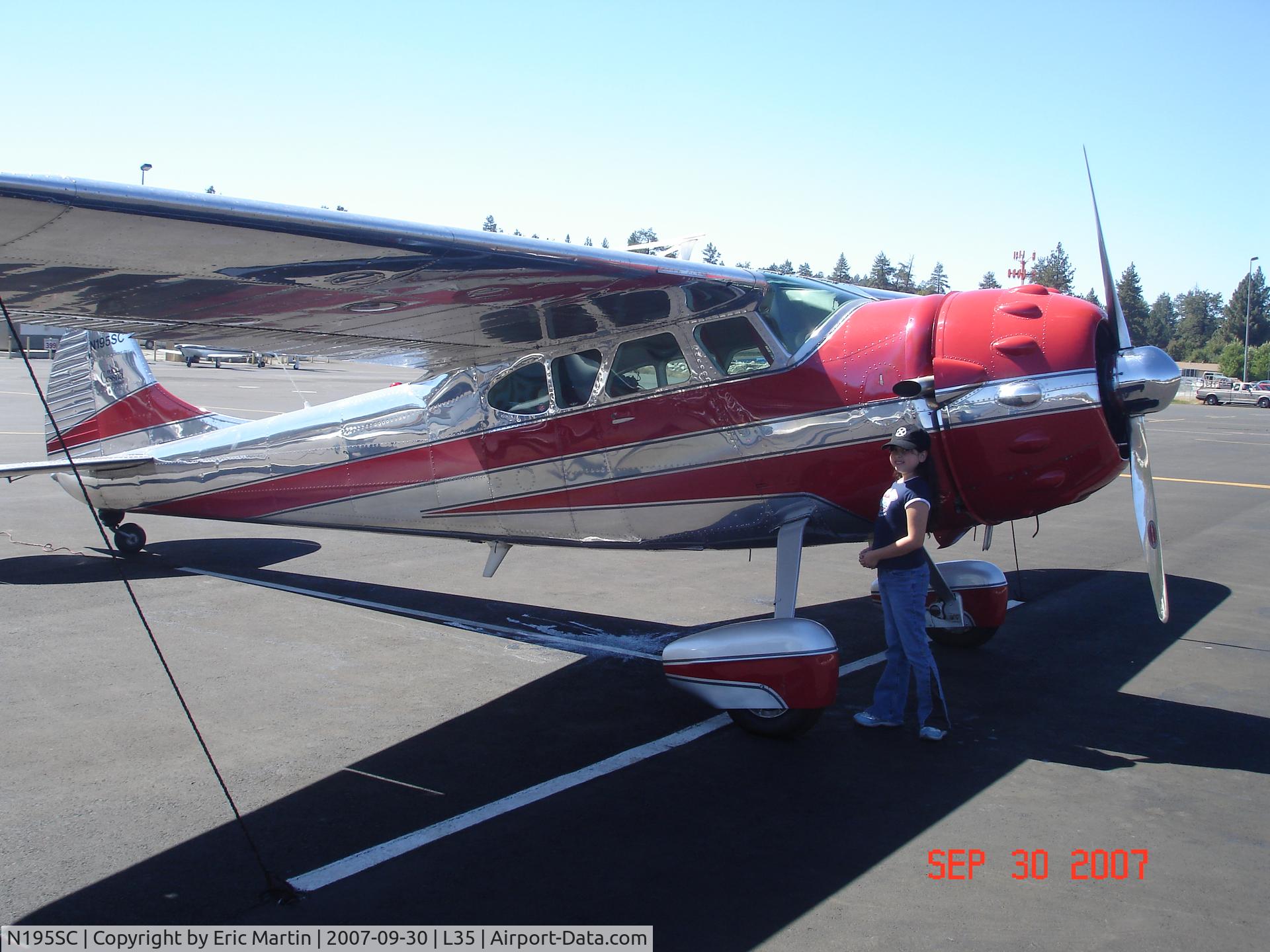 N195SC, 1949 Cessna 195 C/N 7402, Sammi posing with a beautiful Cessna 195
