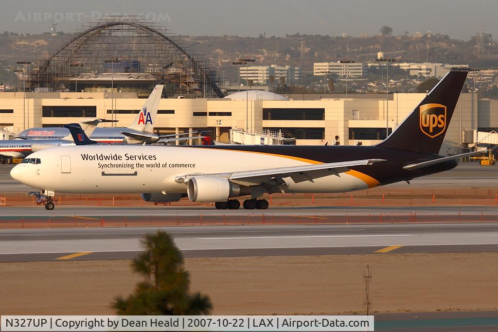 N327UP, 1998 Boeing 767-34AF C/N 27753, UPS N327UP (FLT UPS2920) from Louisville Int'l (KSDF) exitting RWY 25L after arrival.