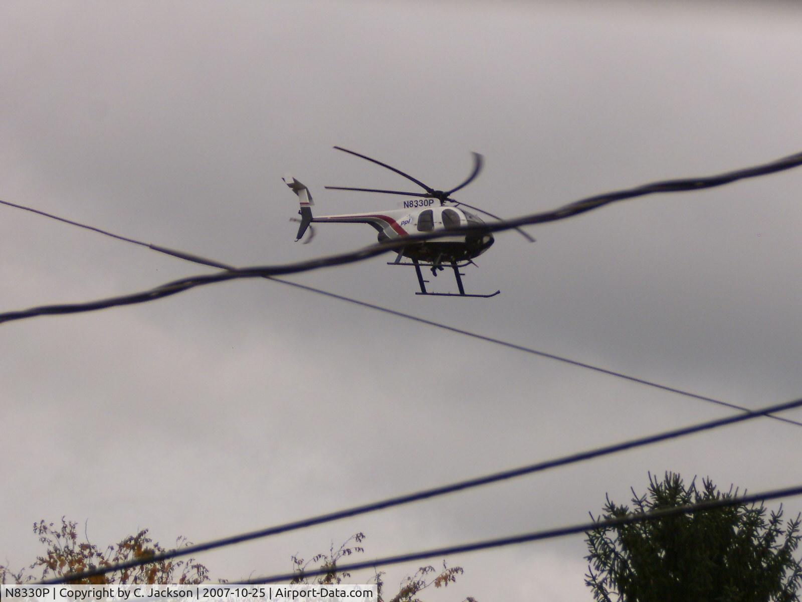 N8330P, 1989 McDonnell Douglas 369E C/N 0330E, Hovering above Crooked Hill Rd in Harrisburg
