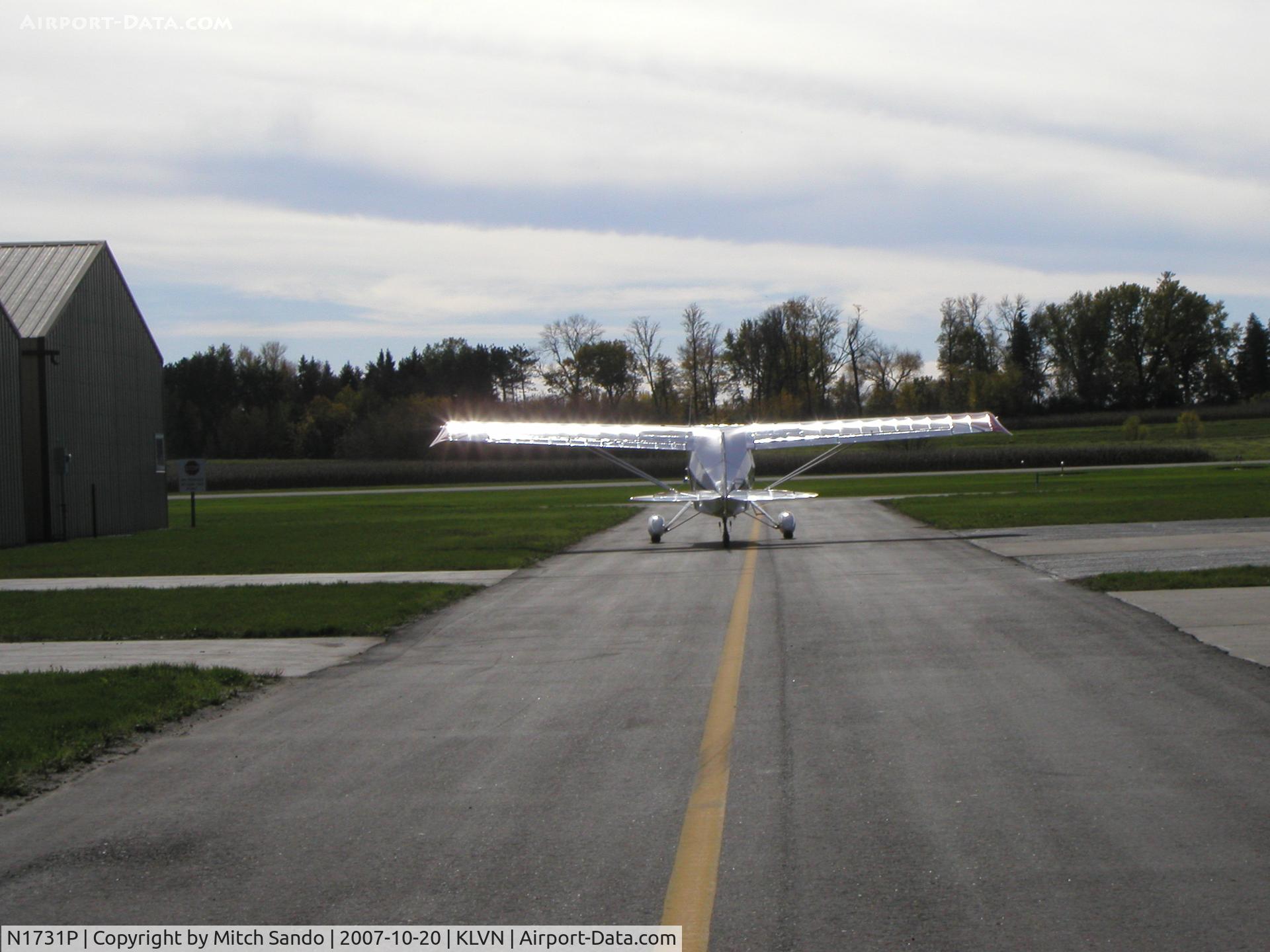 N1731P, 1954 Piper PA-22 C/N 22-2521, Taxiing to Runway 12.