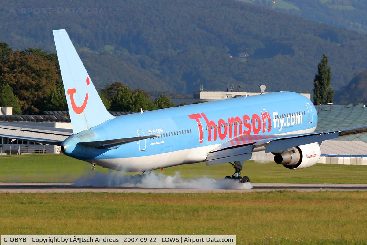 G-OBYB, 1996 Boeing 767-304/ER C/N 28040, smoking touchdown
