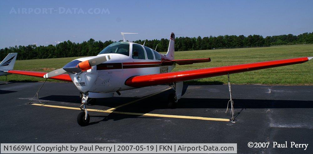 N1669W, 1972 Beech F33A Bonanza C/N CE-392, Had to get closer, nice colors.  Vibrant is a good word