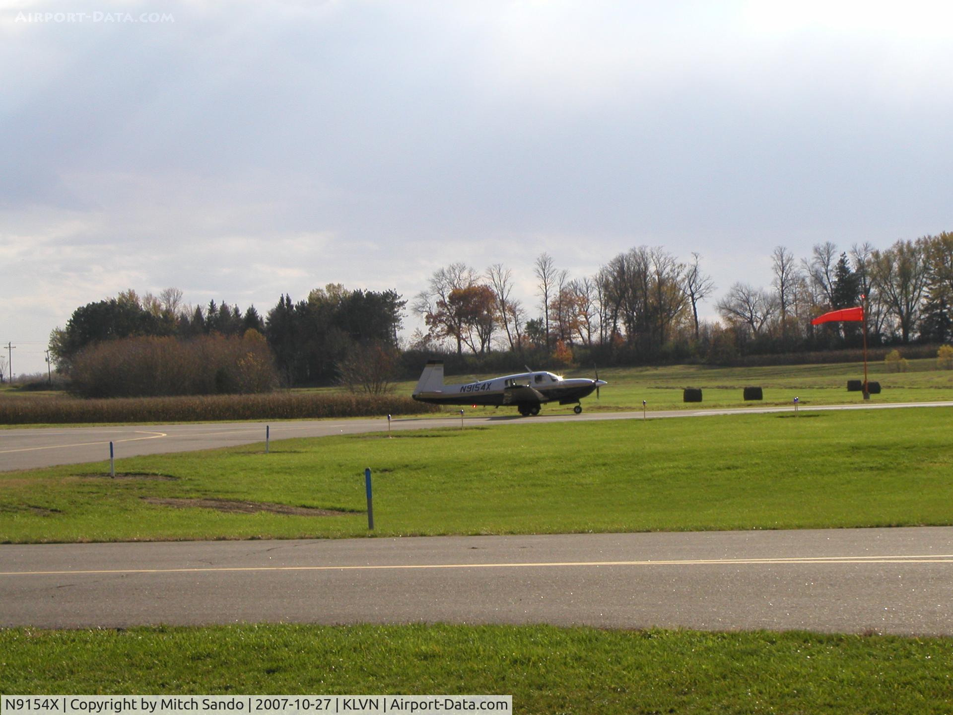 N9154X, 1995 Mooney M20R Ovation C/N 29-0049, Landing Runway 30 from Janesville, WI (JVL). Note: Looks identical to Mooney 9153Y.