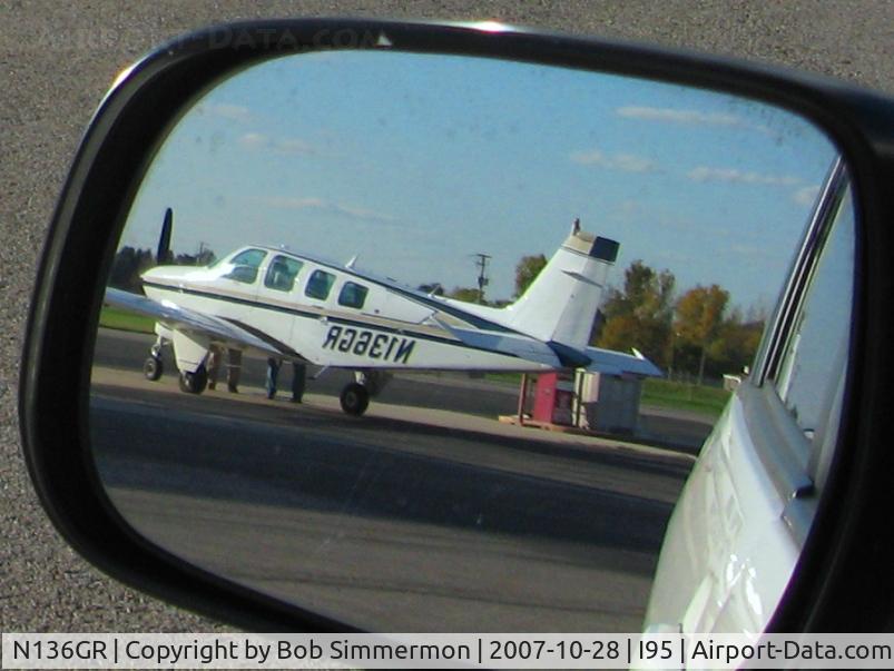 N136GR, 1983 Beech A36 Bonanza 36 C/N E-2115, I was photographing another plane on the ramp at Kenton, OH and found this mirror shot after I got home.