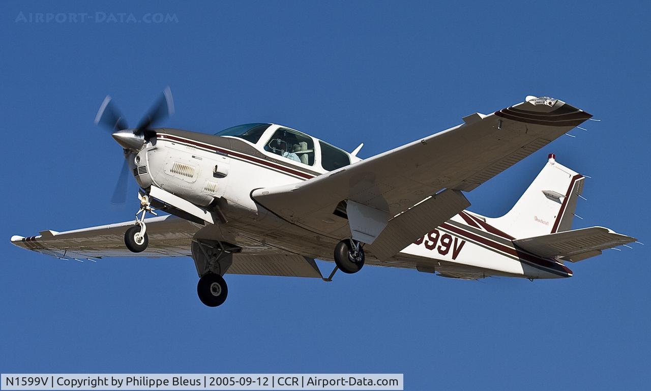 N1599V, 1947 Beech 35 Bonanza C/N D-55, Low pass over rwy 32R