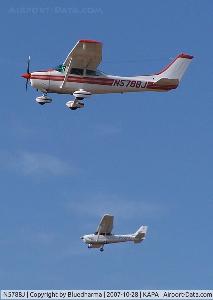 N5788J, 1975 Cessna 182P Skylane C/N 18263536, Approach to 17L with n5327j on 17R (touch and go)