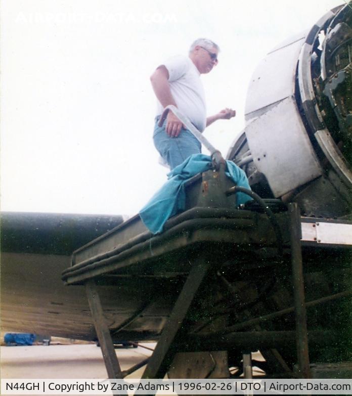 N44GH, 1952 Douglas Super R4D-8 C/N 43393, Glenn Hyde at work on his Super R4D - - this aircraft served as a USN Blue Angels support aircraft between 