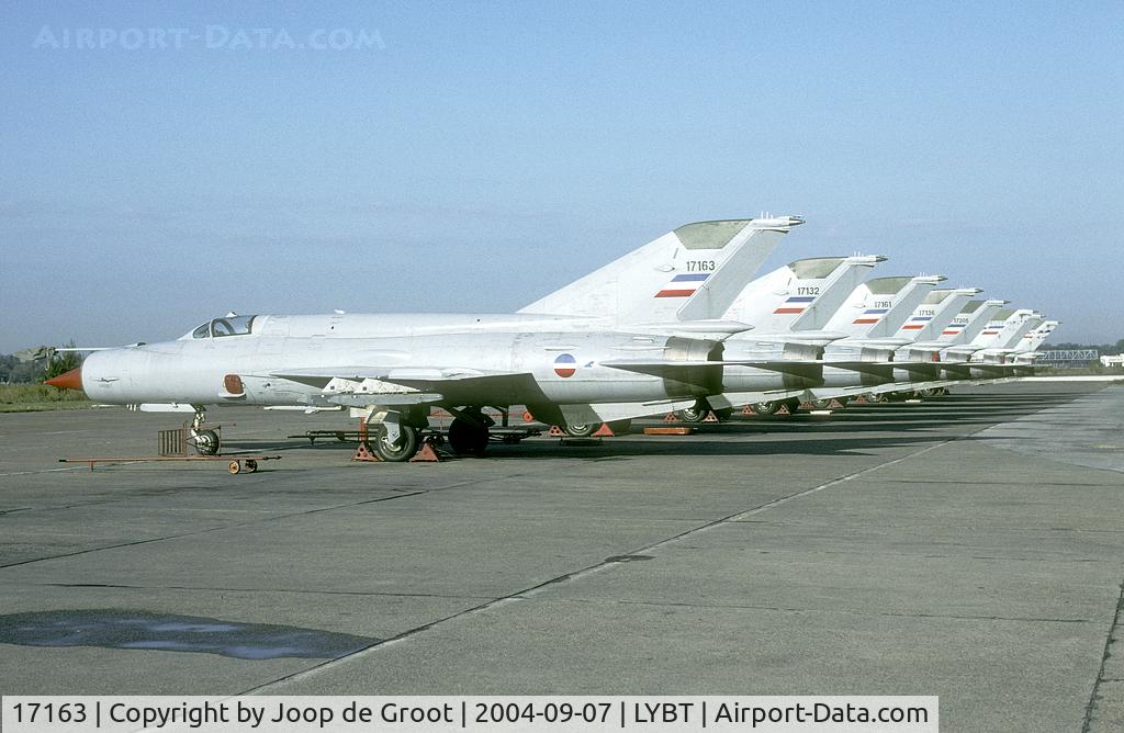 17163, Mikoyan-Gurevich MiG-21bis-K C/N 75073991, A line packed with MiG-21's. At the time the MiG-21 was the sole interceptor of the Serbian AF.