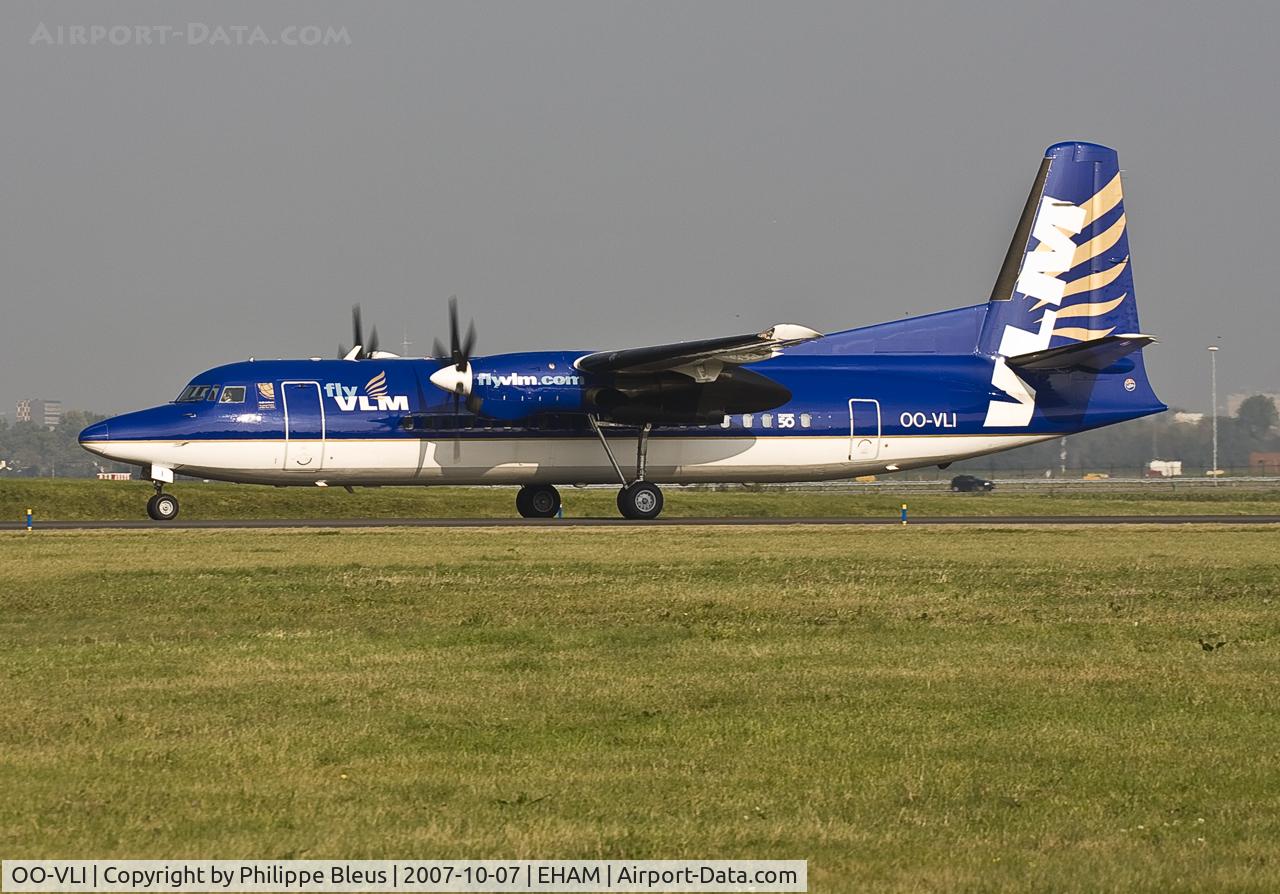 OO-VLI, 1991 Fokker 50 C/N 20226, new acquisition of VLM, taxiing through the Dutch green meadows to runway 36L/18R.