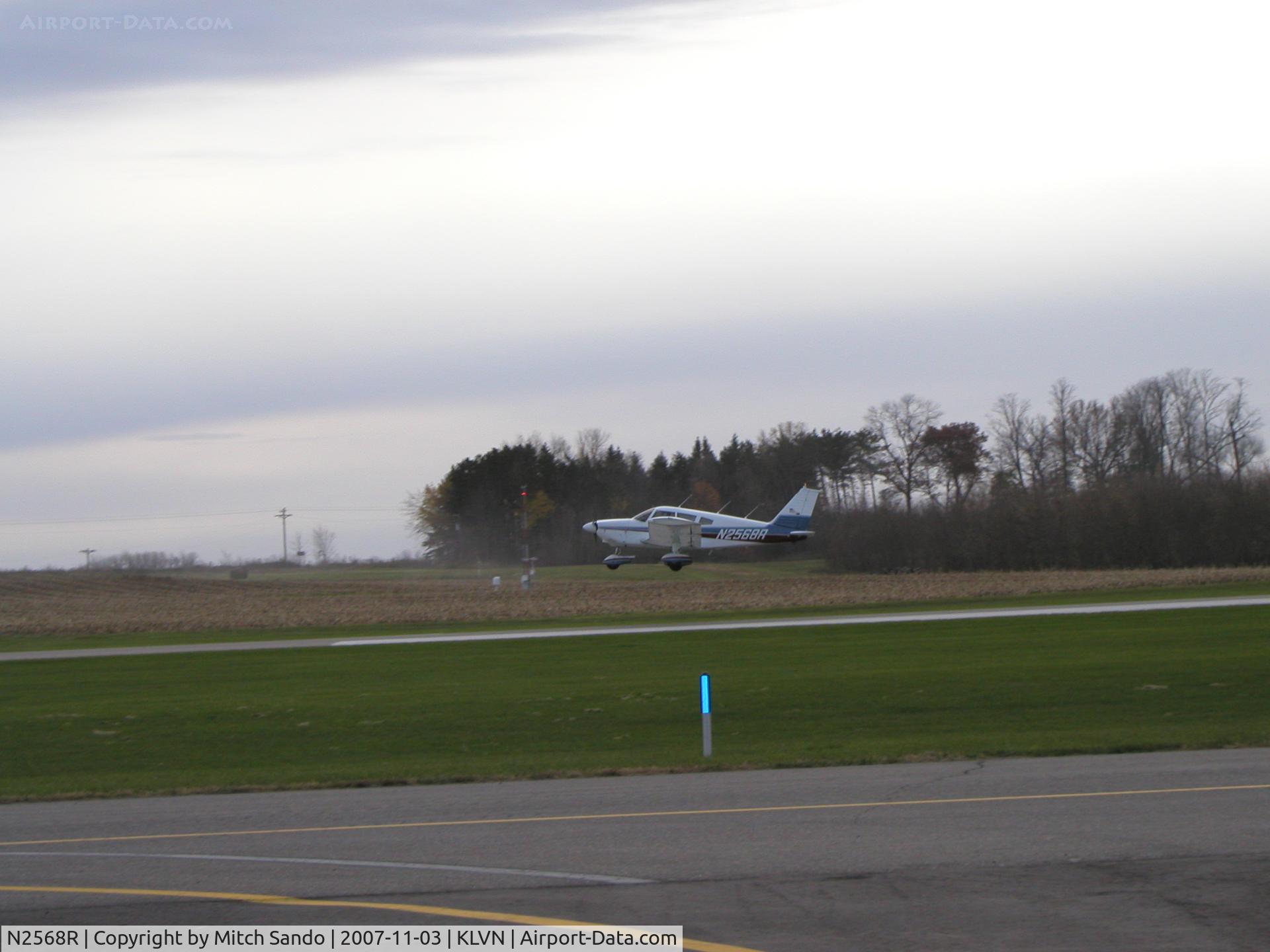 N2568R, 1969 Piper PA-28-180 C/N 28-5649, Touch n' Go Runway 12.
