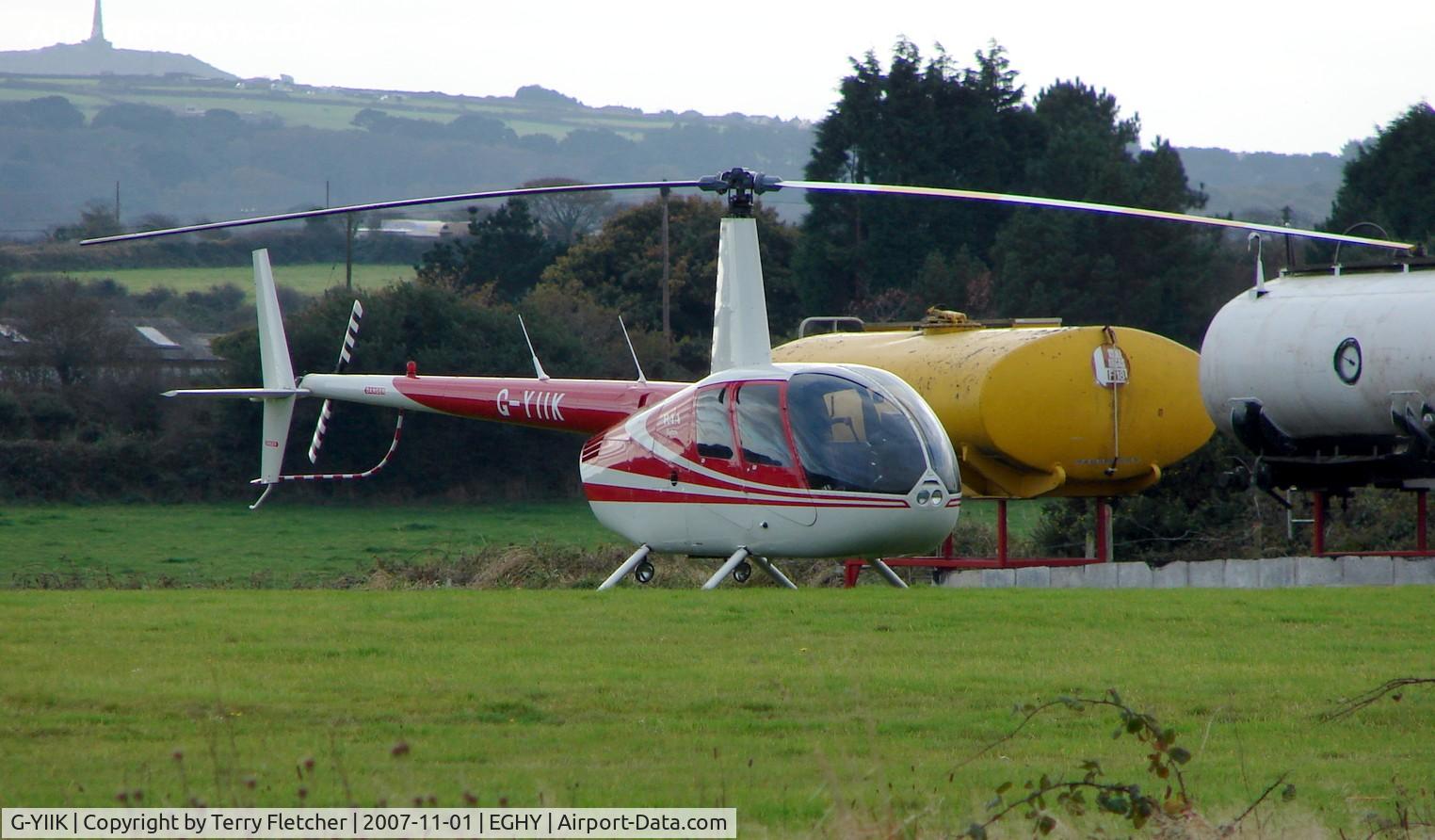 G-YIIK, 1999 Robinson R44 C/N 0640, The only aircraft at this small Cornish strip