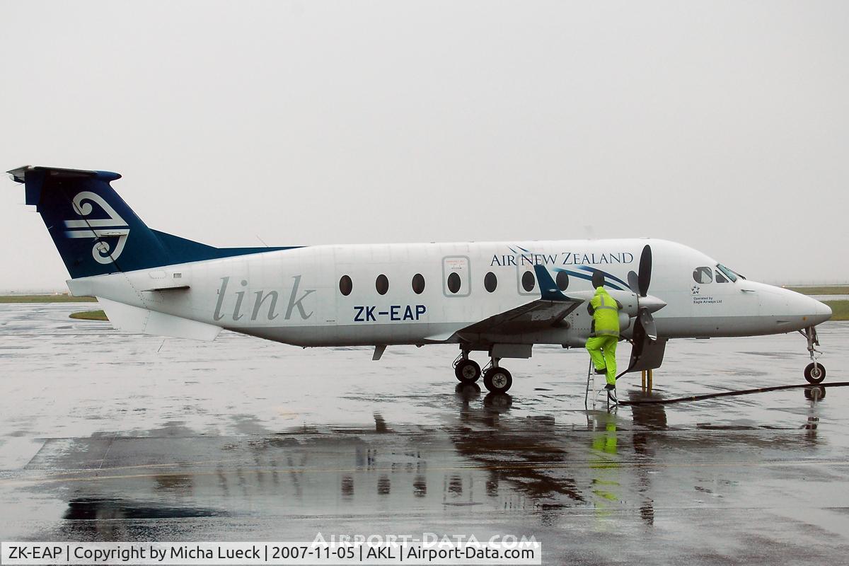 ZK-EAP, 2002 Raytheon 1900D C/N UE-439, Refuelling on a rainy day in Auckland