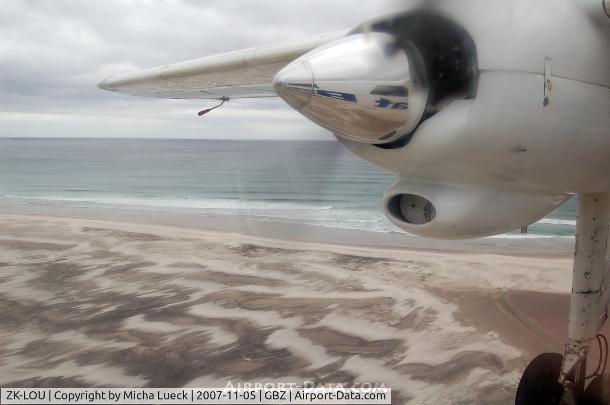 ZK-LOU, 1972 Britten-Norman BN-2A Mk.III-2 Trislander C/N 322, Crossing the beach just before touch-down in Claris, Great Barrier Island