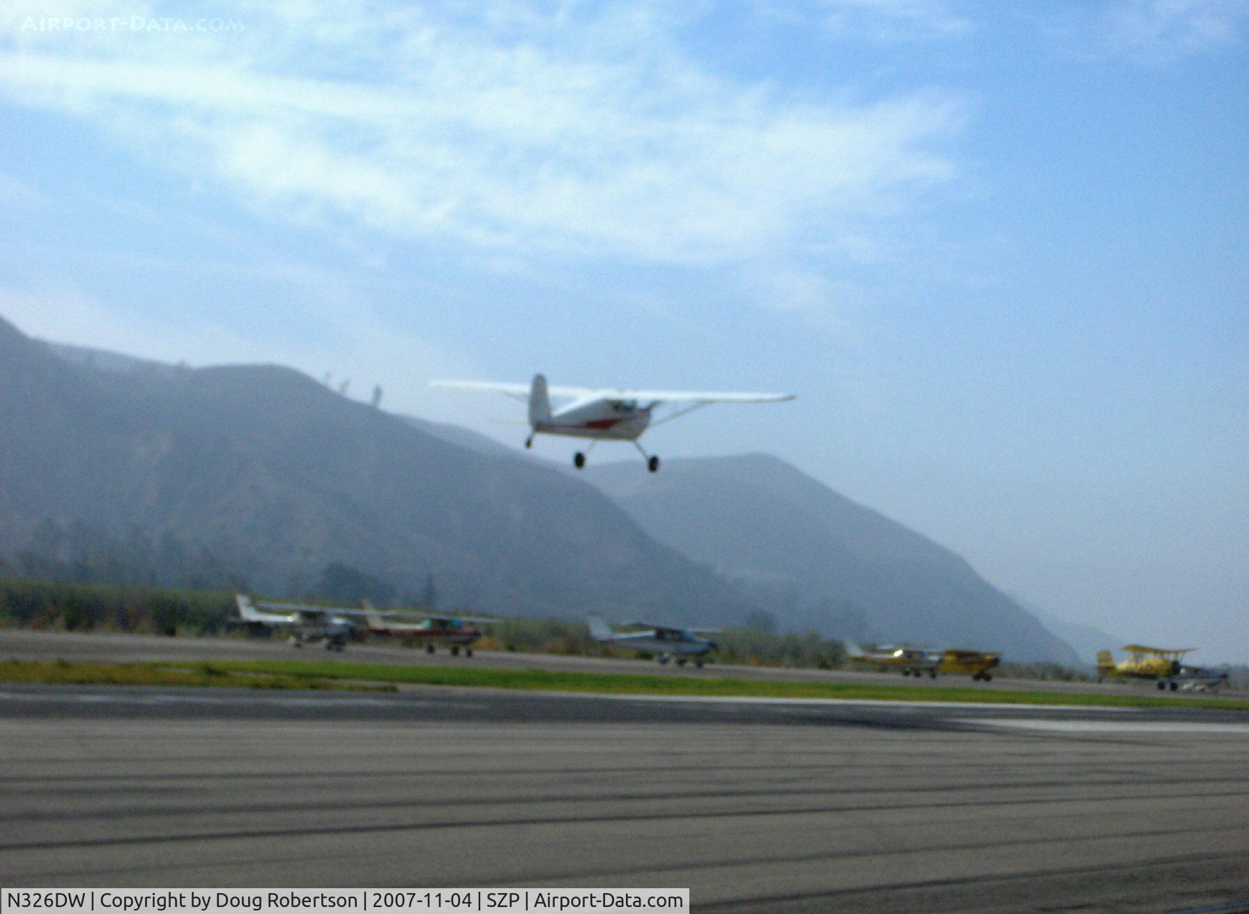 N326DW, 1946 Cessna 140 C/N 11220, 1946 Cessna 140, Continental O-200 100 Hp upgrade, takeoff Rwy 22 in morning haze